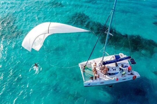 Catamaran Party on the Caribbean Sea to Isla Mujeres - Open bar Included