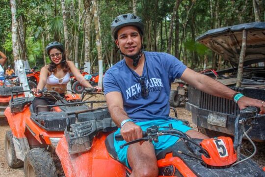 Drive an Atv shared, swim in a Cenote and ziplines in the Cancun