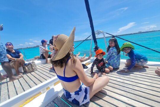 The Best Luxury Catamaran Experience to Isla Mujeres + Beach Club