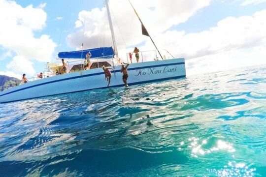 Isla Mujeres tour in a Catamaran with snorkel, open bar, lunch and beach club.