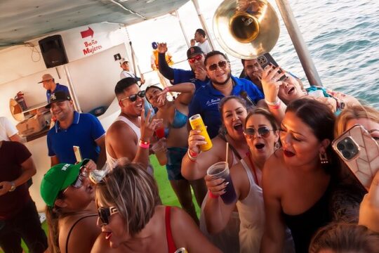 Sunset Party Catamaran with Live Music and Open Bar Adventure