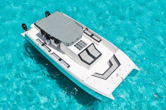 4 Hour Atomic 47 ft Catamaran with Isla Mujeres and El Meco Reef