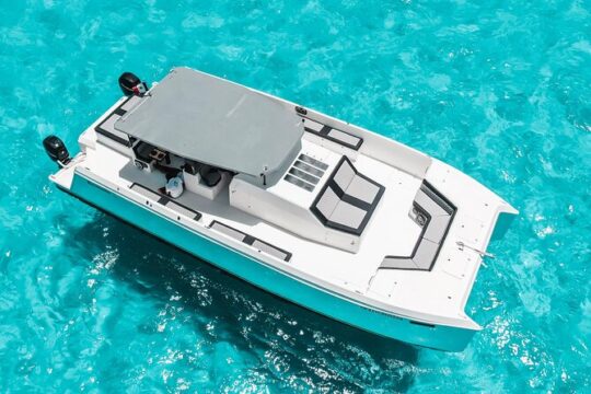 7 Hour Atomic 47 ft Catamaran with Isla Mujeres and El Meco Reef